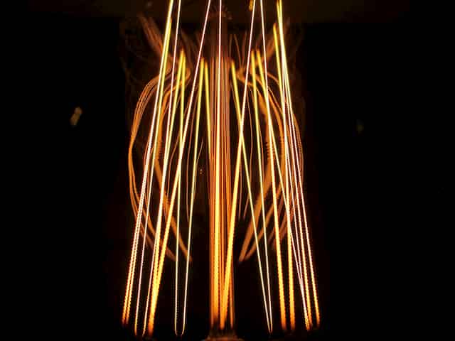 Image of Glowing Light Bulb Filament Threads like our Life Path